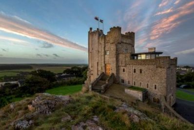 Roch_Castle_Pink_Skies_over_St_Brides_Bay_-_Copy.jpg