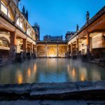 Enjoy a torchlit summer's evening at the Roman Baths in Bath