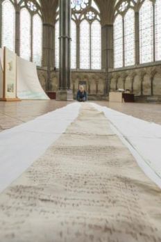 Cathedral_Archivist_Emily_Naish_measures_Robert_de_Cardevilles_19ft_scroll_-_Photo_by_Ash_Mills_2_-_Copy.jpg